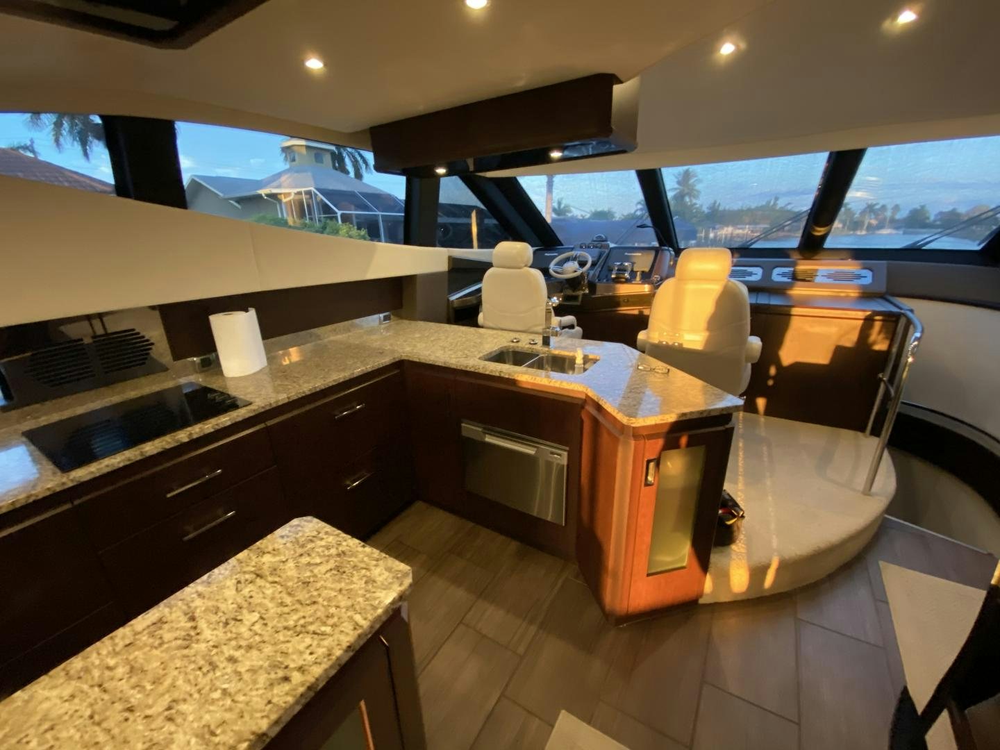 a kitchen with a large window aboard No Name Yacht for Sale