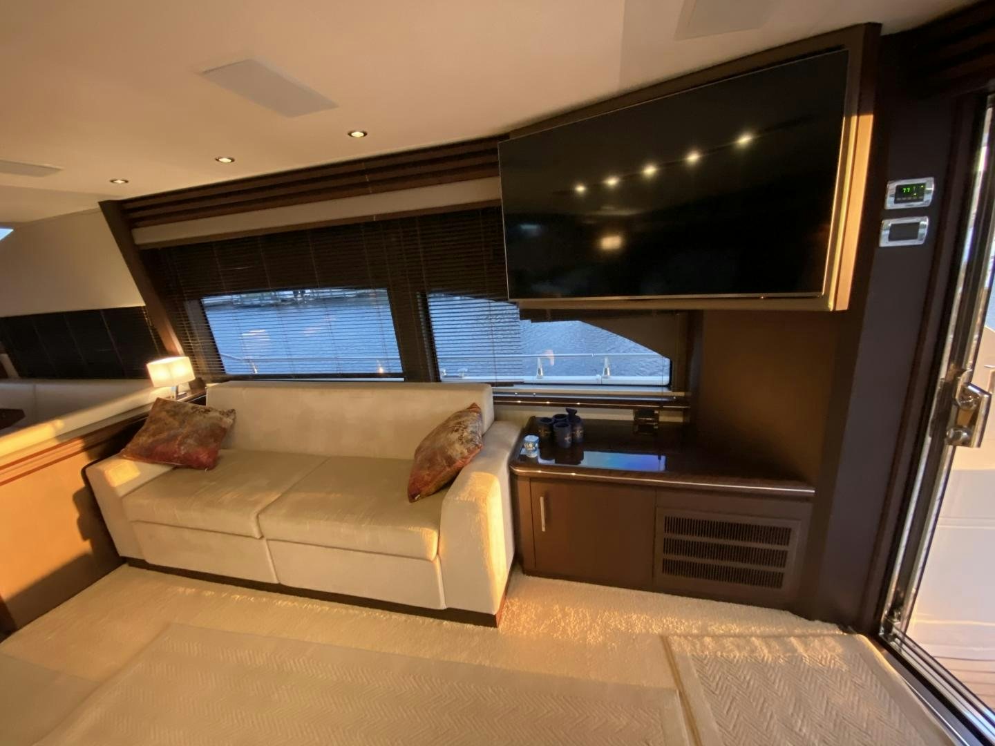 a couch in a room aboard No Name Yacht for Sale