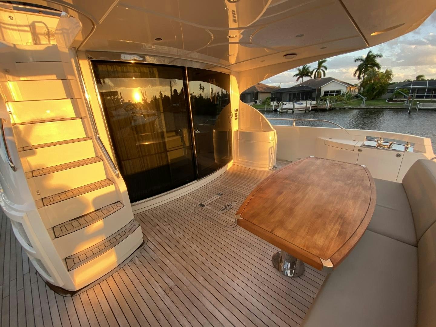 a room with a couch and a table and a pool aboard No Name Yacht for Sale