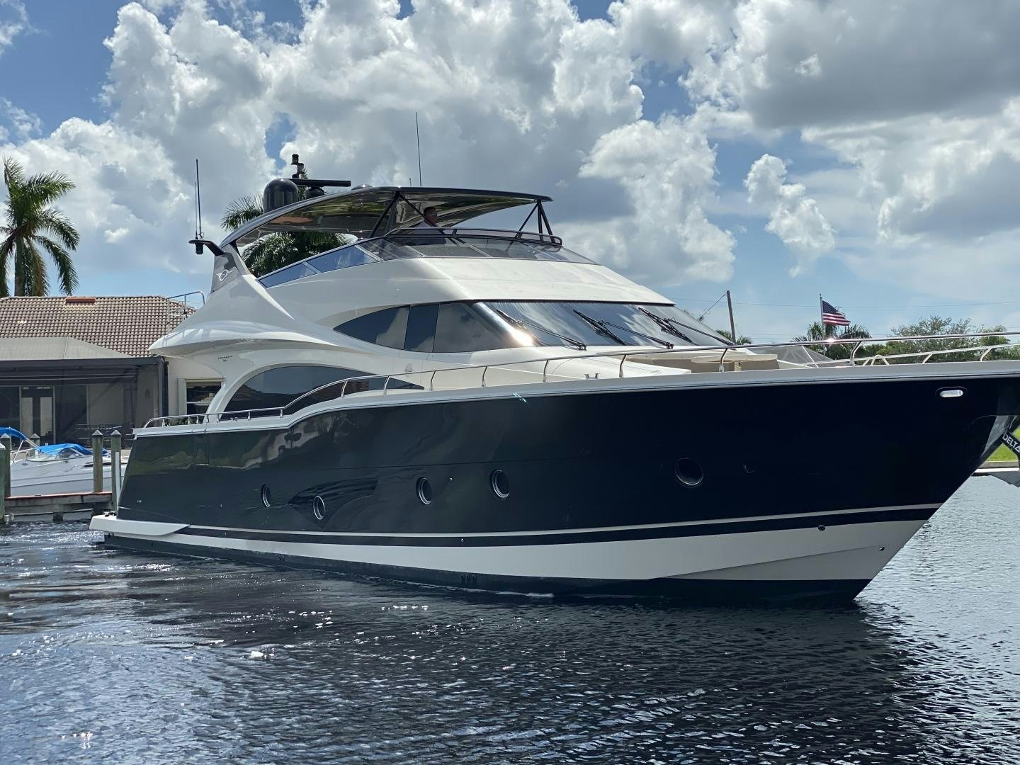 a white yacht on the water aboard No Name Yacht for Sale
