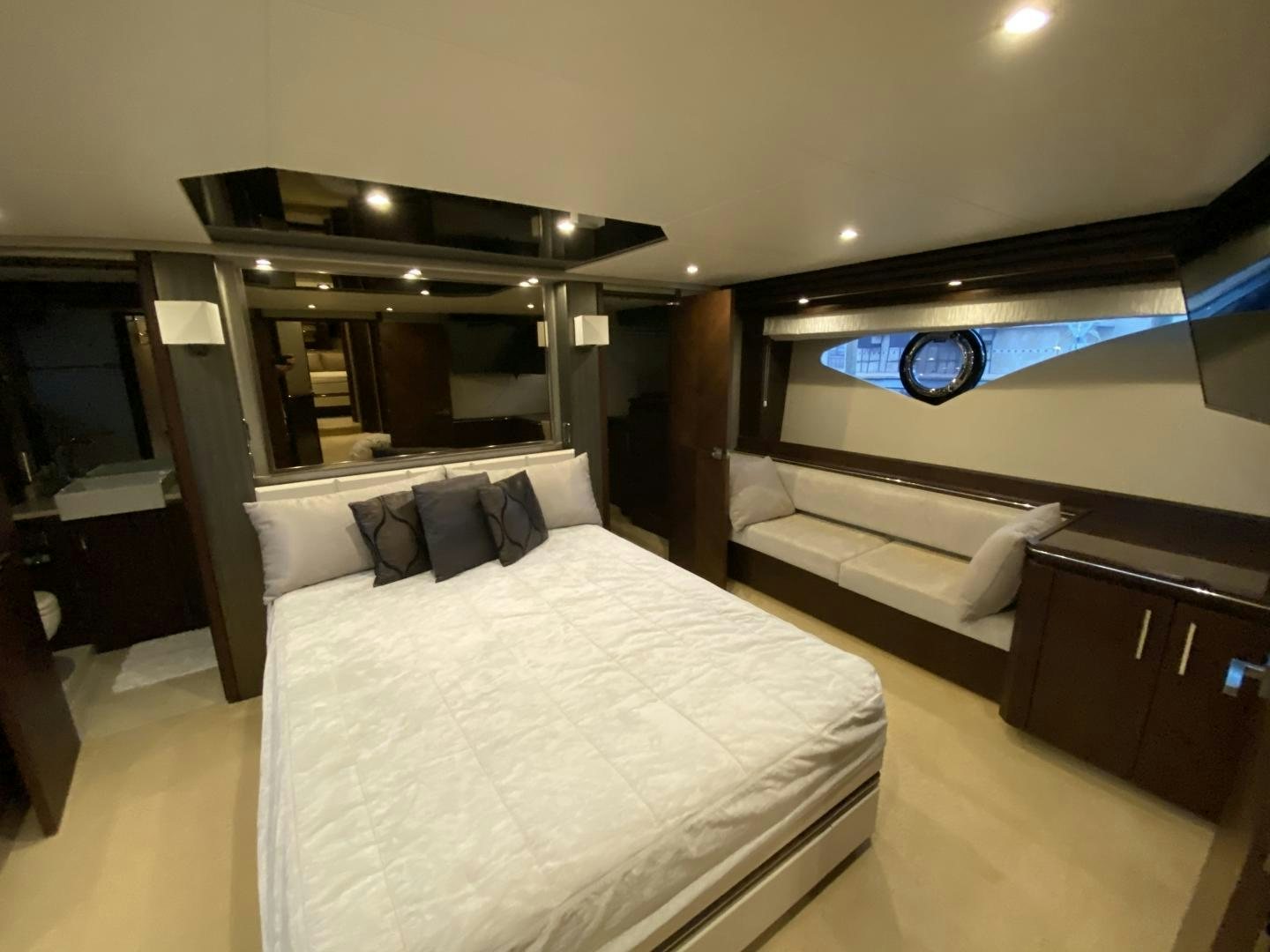 a room with a bed and a desk aboard No Name Yacht for Sale