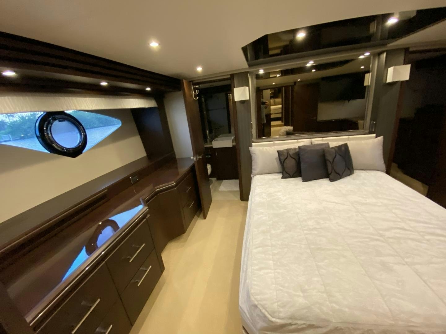 a bedroom with a large bed aboard No Name Yacht for Sale