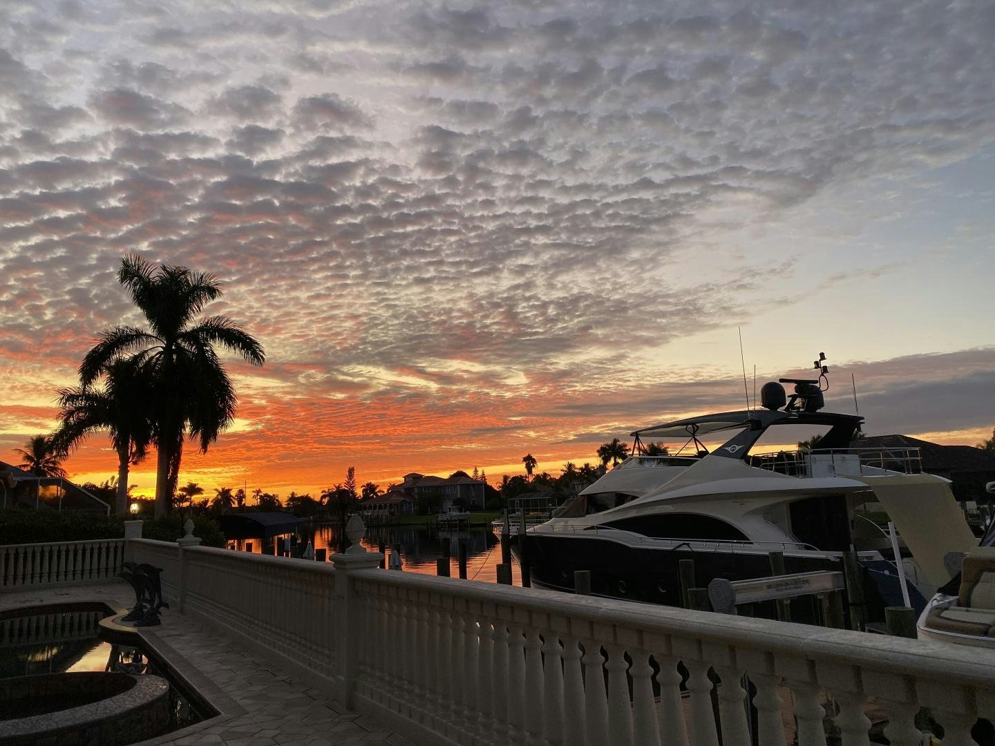 a sunset over a boat aboard No Name Yacht for Sale
