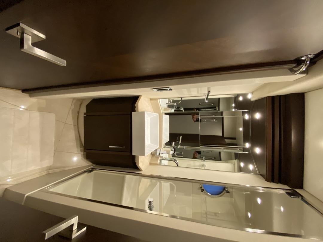 a kitchen with a large sink aboard No Name Yacht for Sale