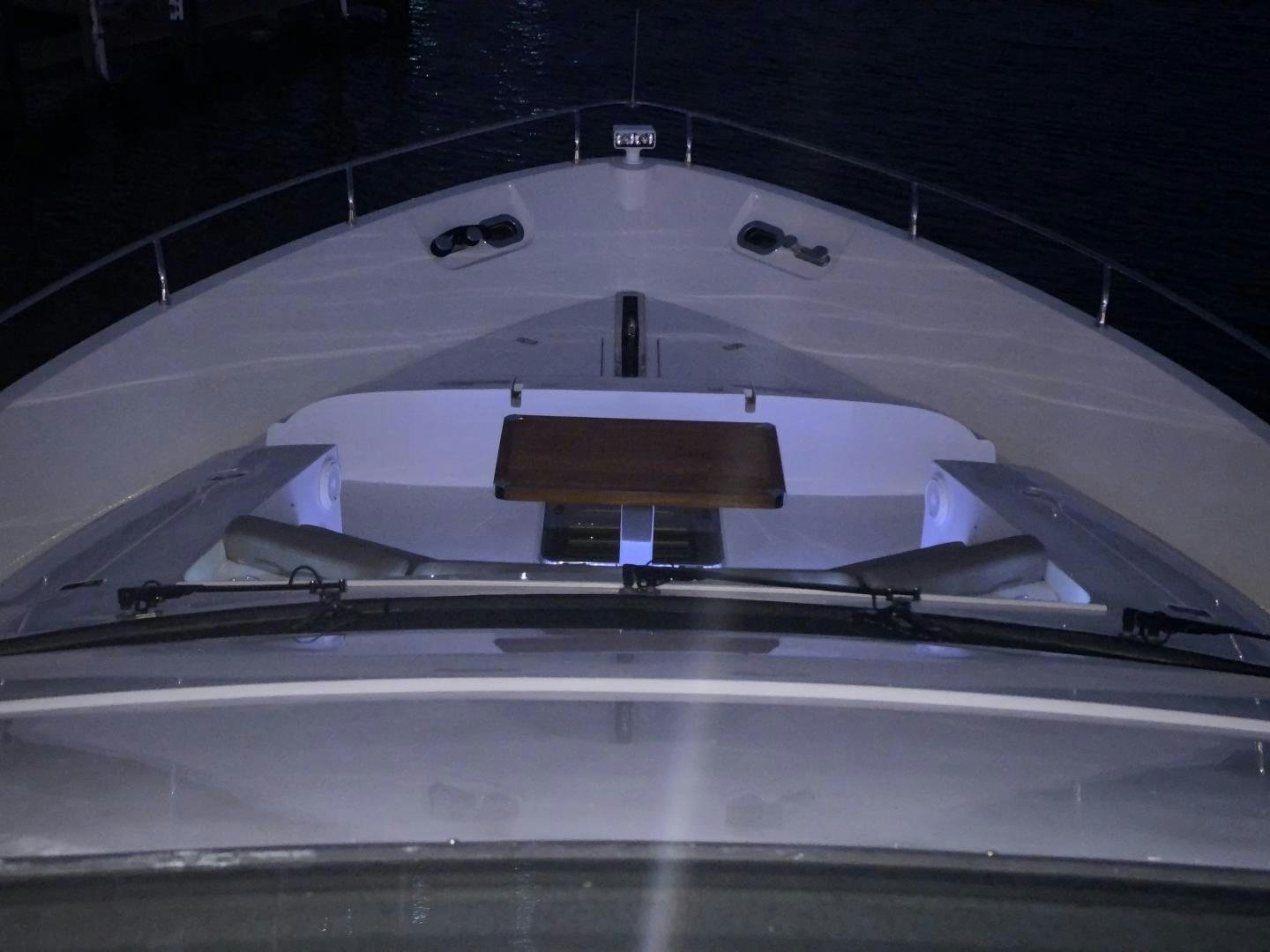 a white rectangular object with a black background aboard No Name Yacht for Sale