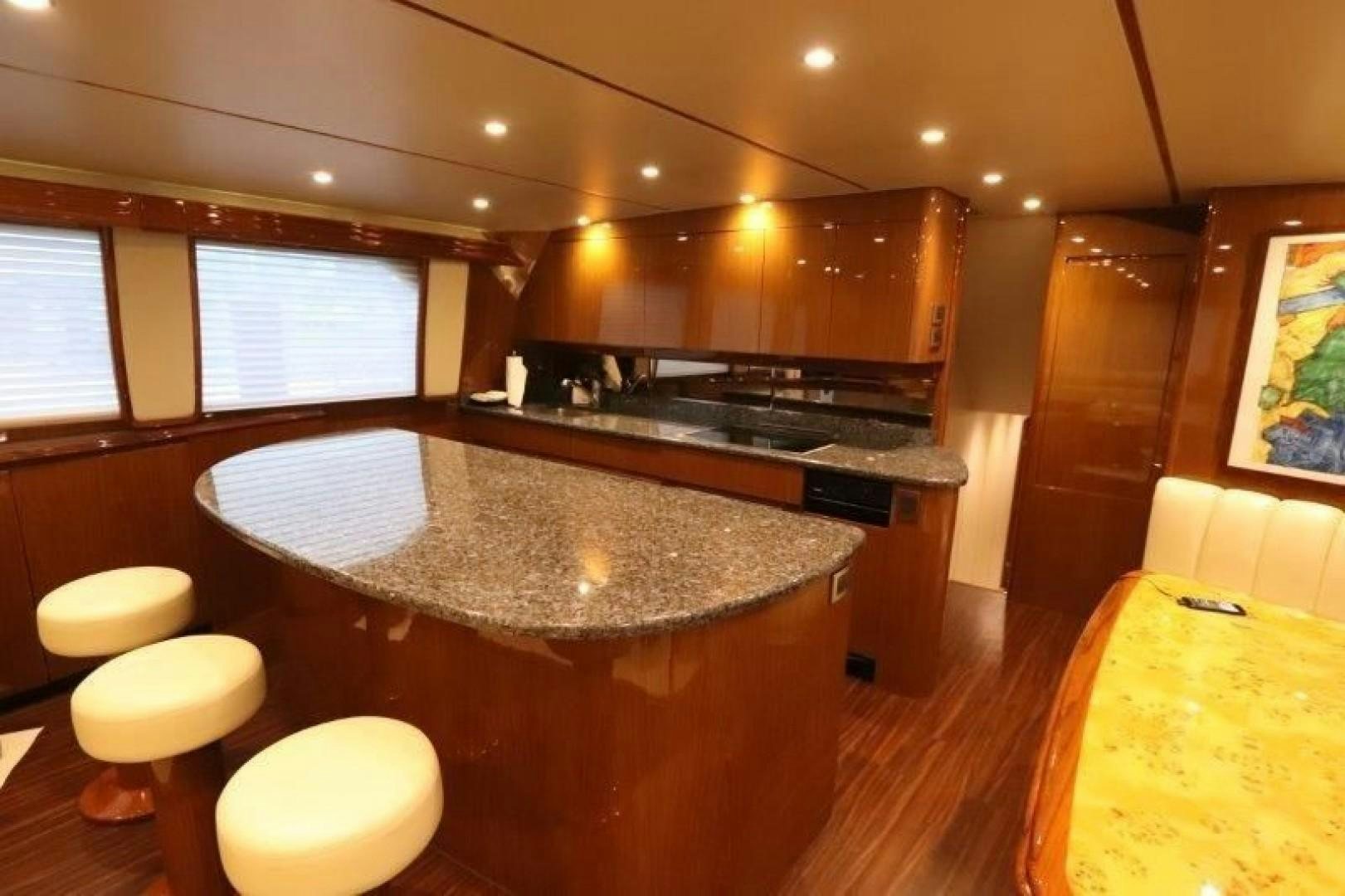 a kitchen with a large island aboard No Name Yacht for Sale