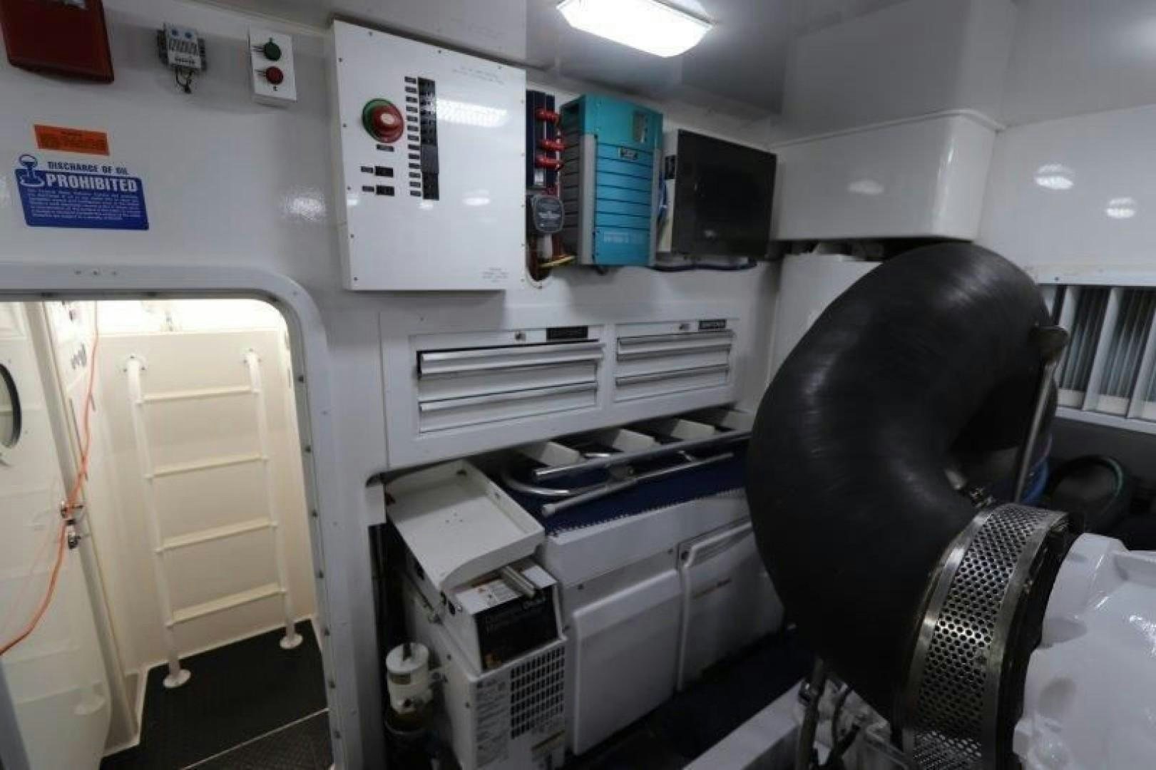a person sitting in a chair in a room with medical equipment aboard No Name Yacht for Sale
