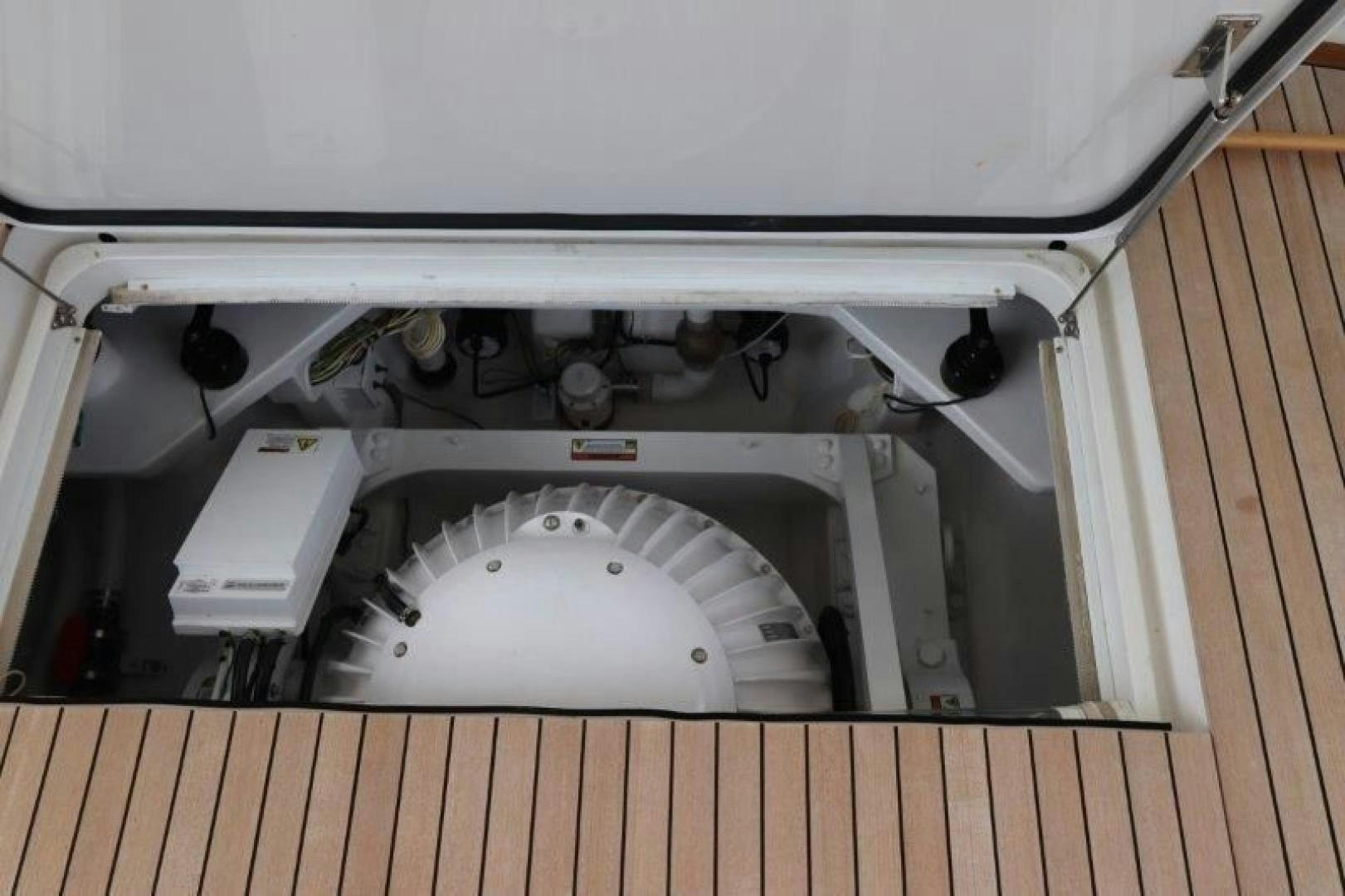 a large white machine aboard No Name Yacht for Sale