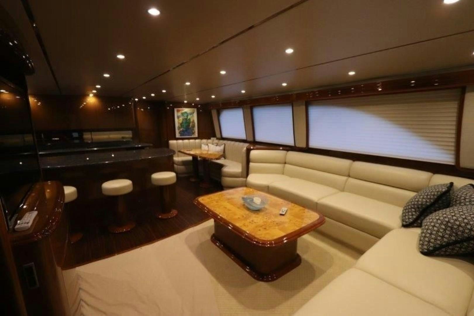 a living room with a large window aboard No Name Yacht for Sale