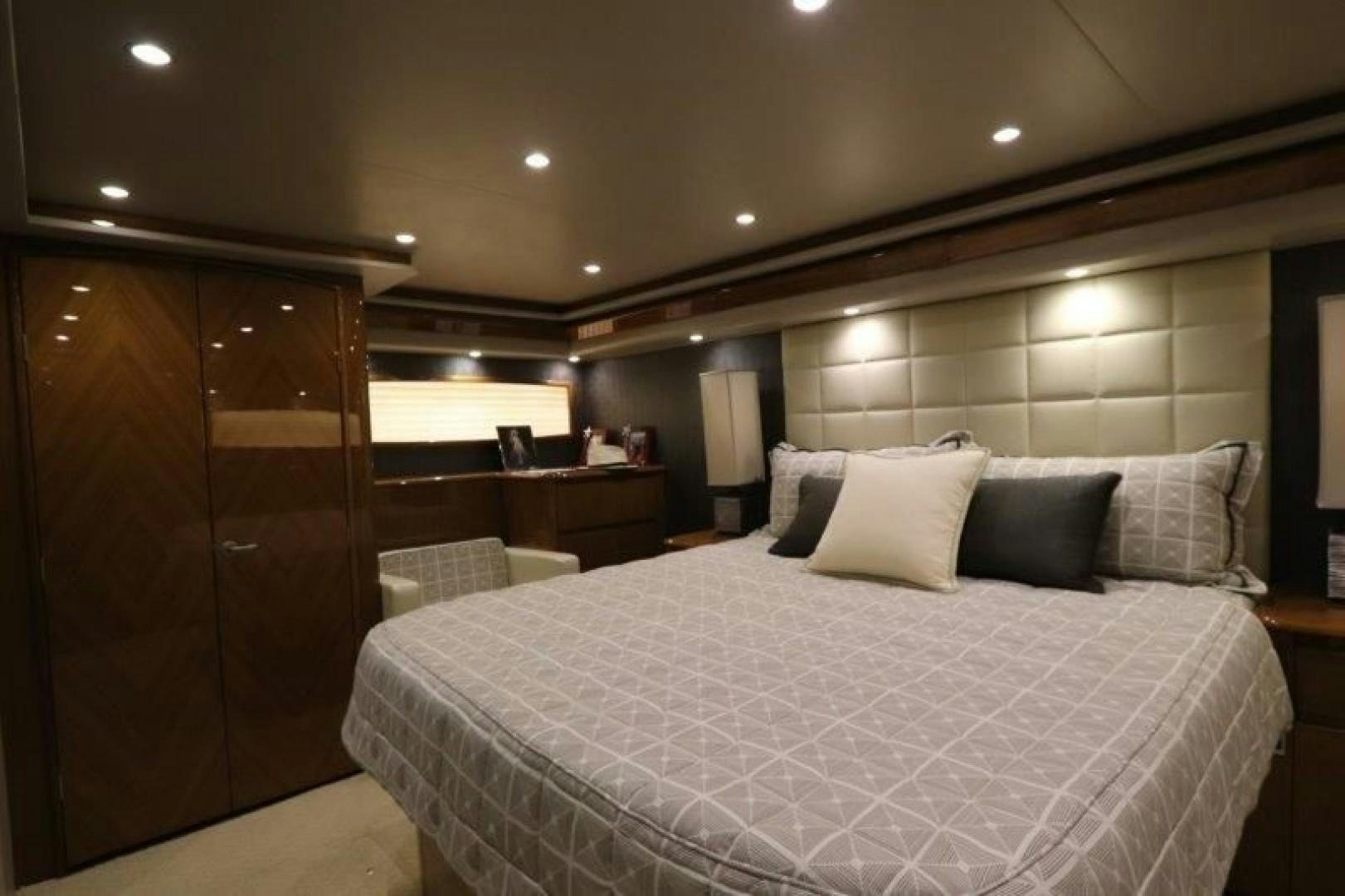 a bed in a hotel room aboard No Name Yacht for Sale