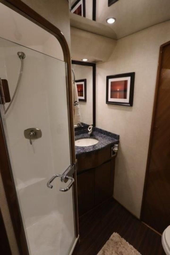 a bathroom with a sink and a shower aboard No Name Yacht for Sale