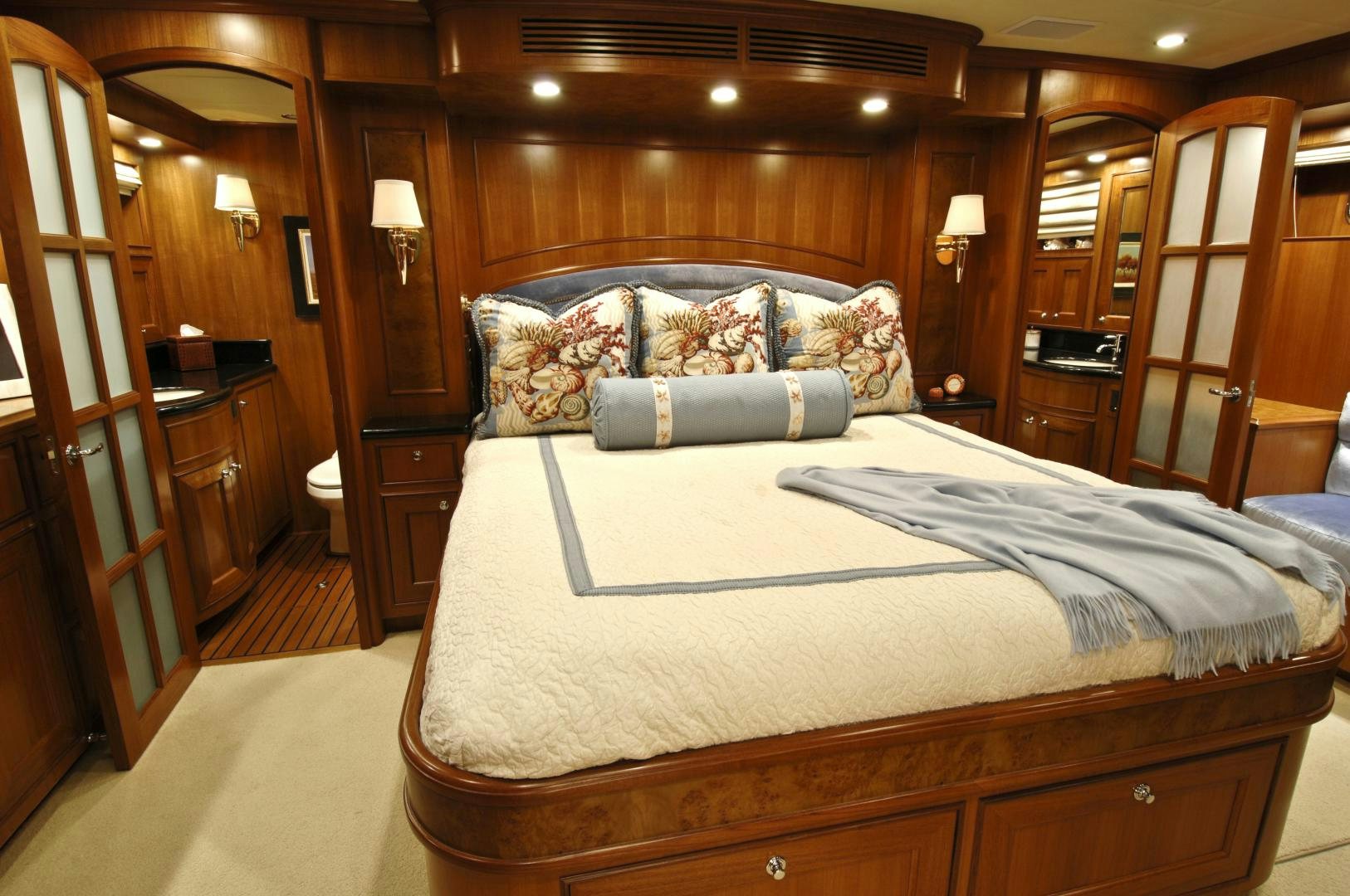 a bed in a room aboard No Name Yacht for Sale