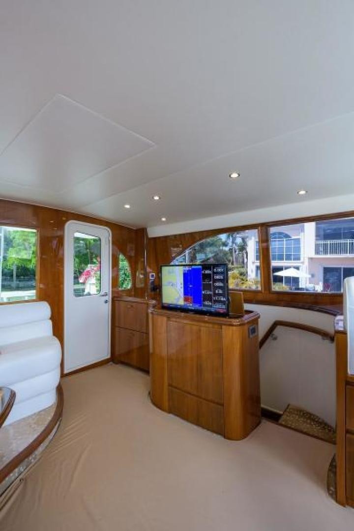 a room with a bed and a desk aboard OSH IT Yacht for Sale