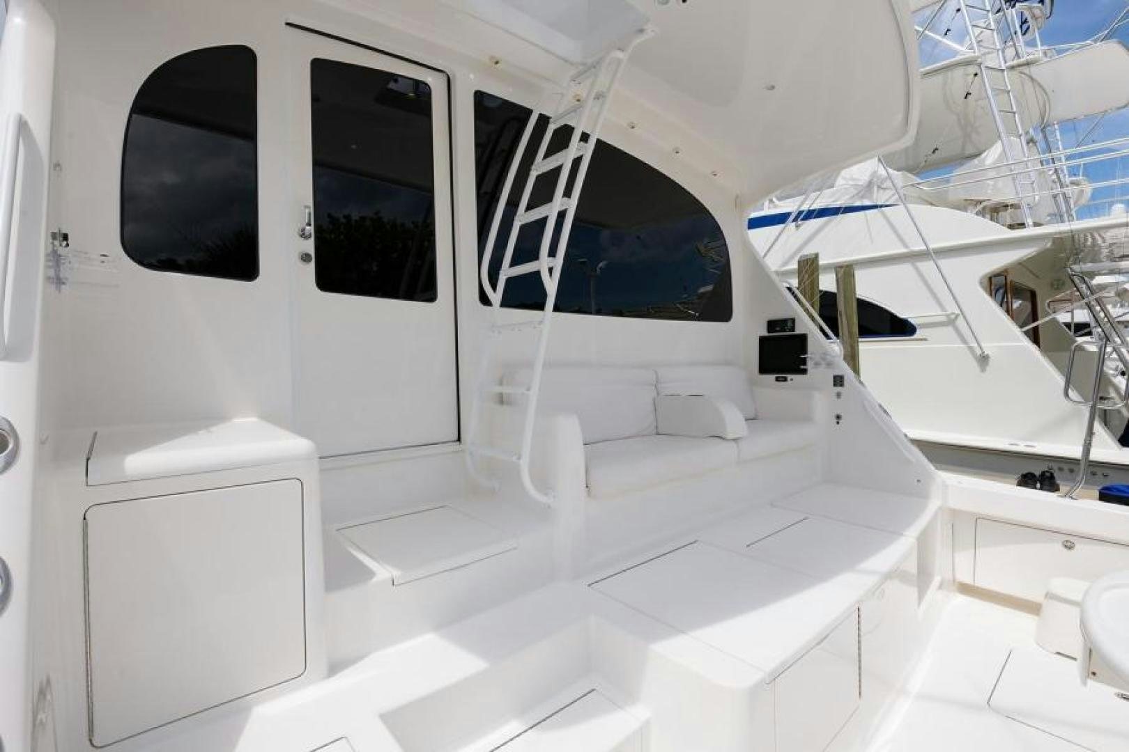 a room with a bed and a window aboard OSH IT Yacht for Sale
