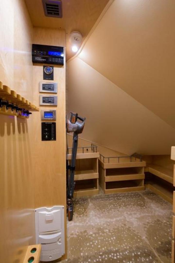 a machine in a room aboard OSH IT Yacht for Sale