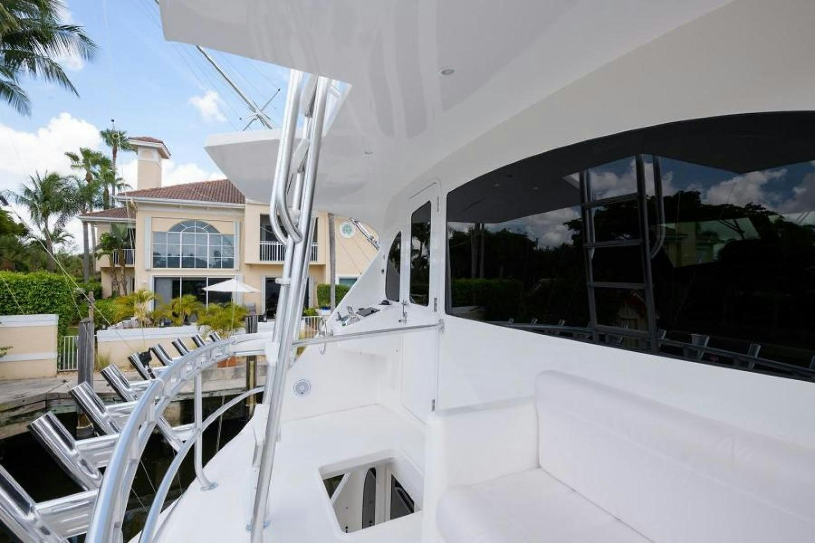 a white house with a white roof aboard OSH IT Yacht for Sale