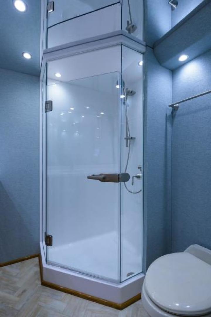 a shower unit in a bathroom aboard OSH IT Yacht for Sale