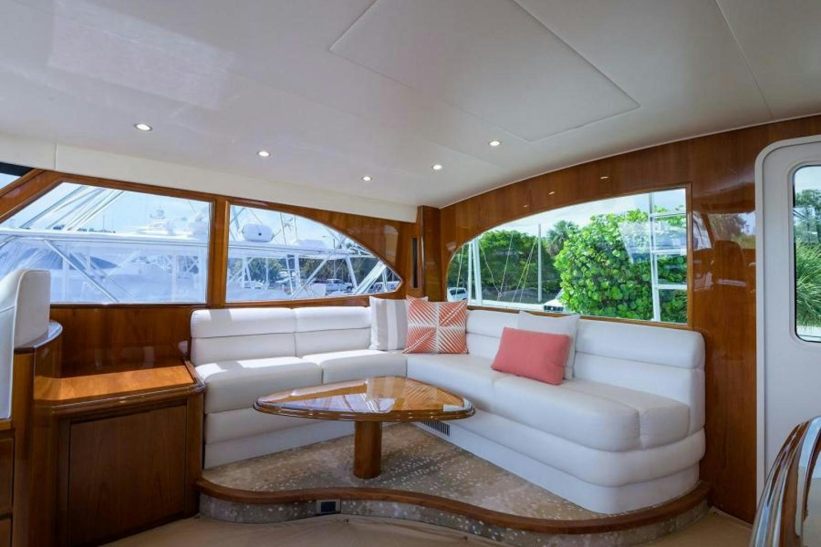 a living room with a couch and a table aboard OSH IT Yacht for Sale