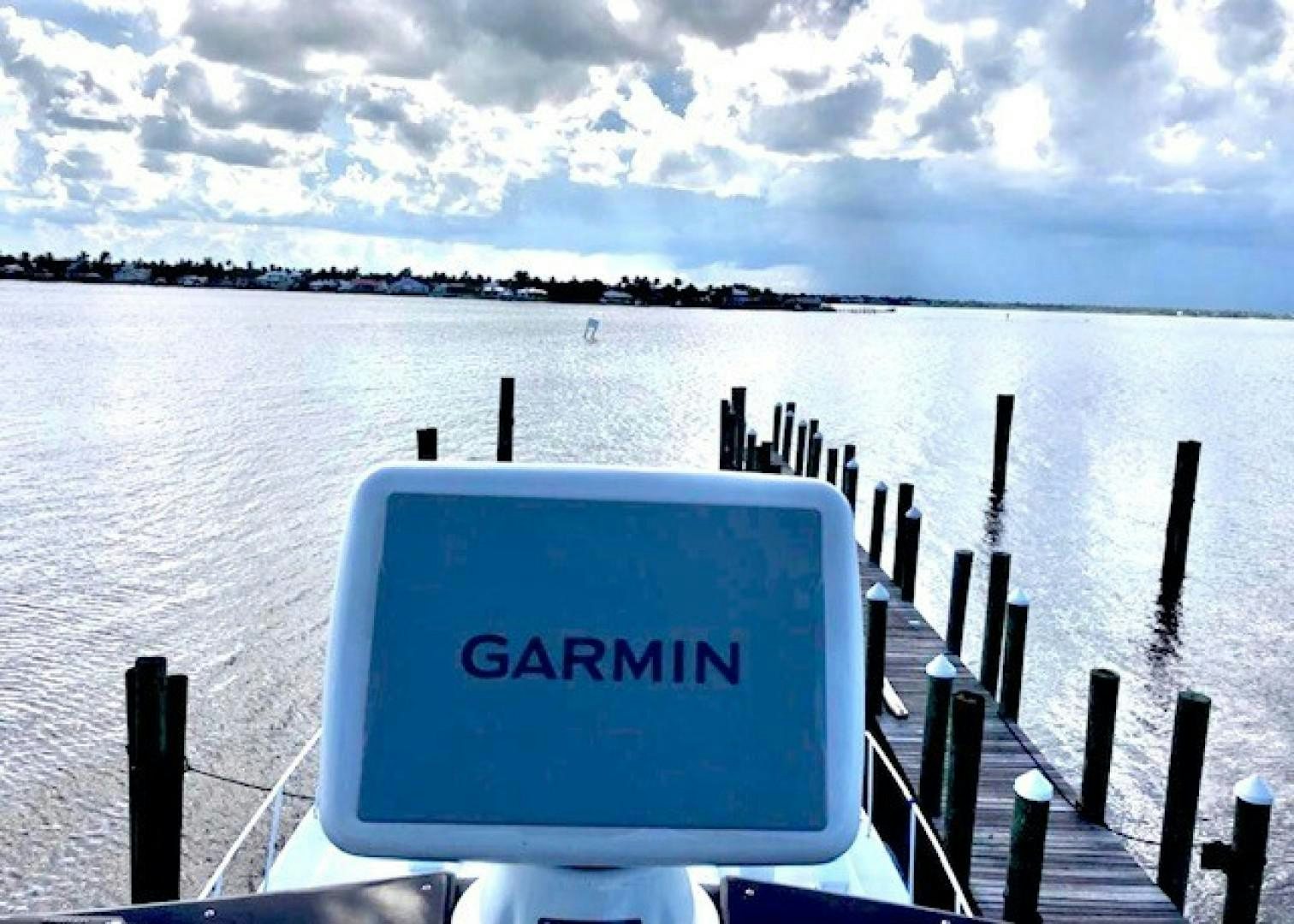 a billboard in front of a body of water aboard PRIME TIME Yacht for Sale