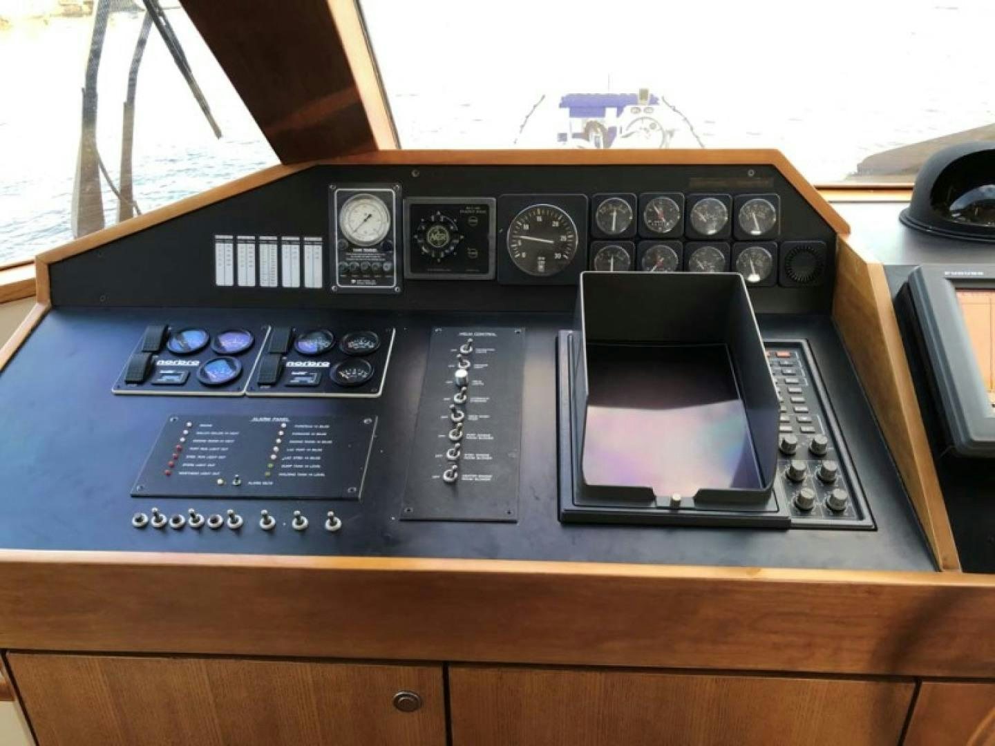 a black electronic device aboard PRIME TIME Yacht for Sale