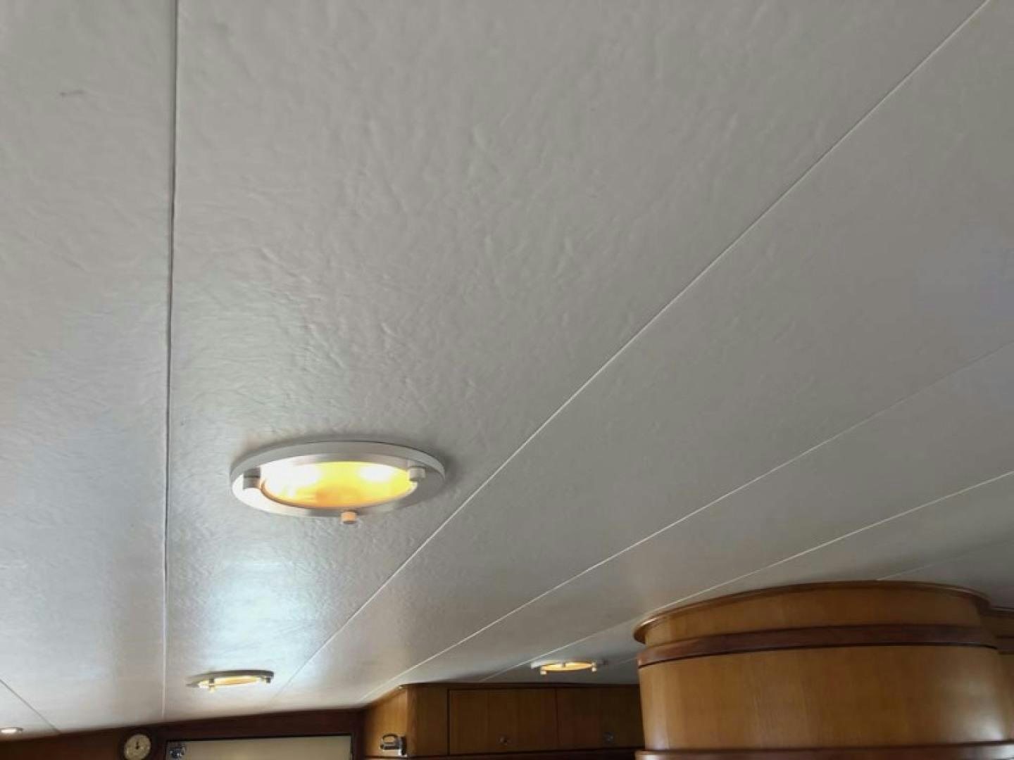 a ceiling with a light fixture aboard PRIME TIME Yacht for Sale