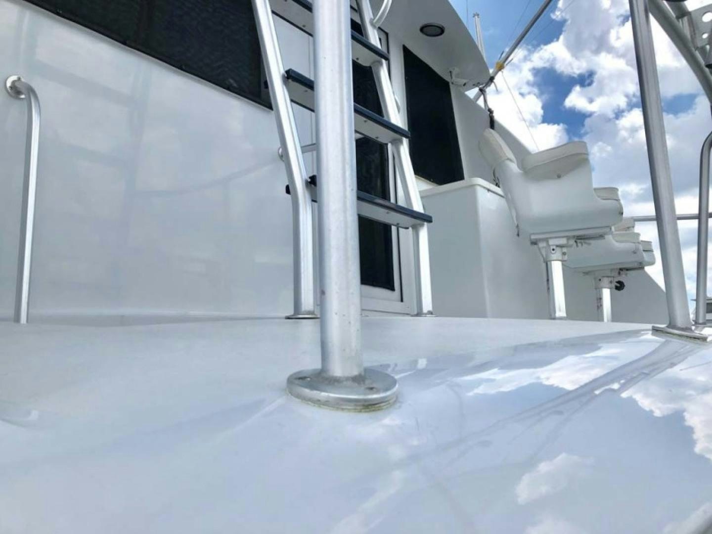 a white building with a tower aboard PRIME TIME Yacht for Sale