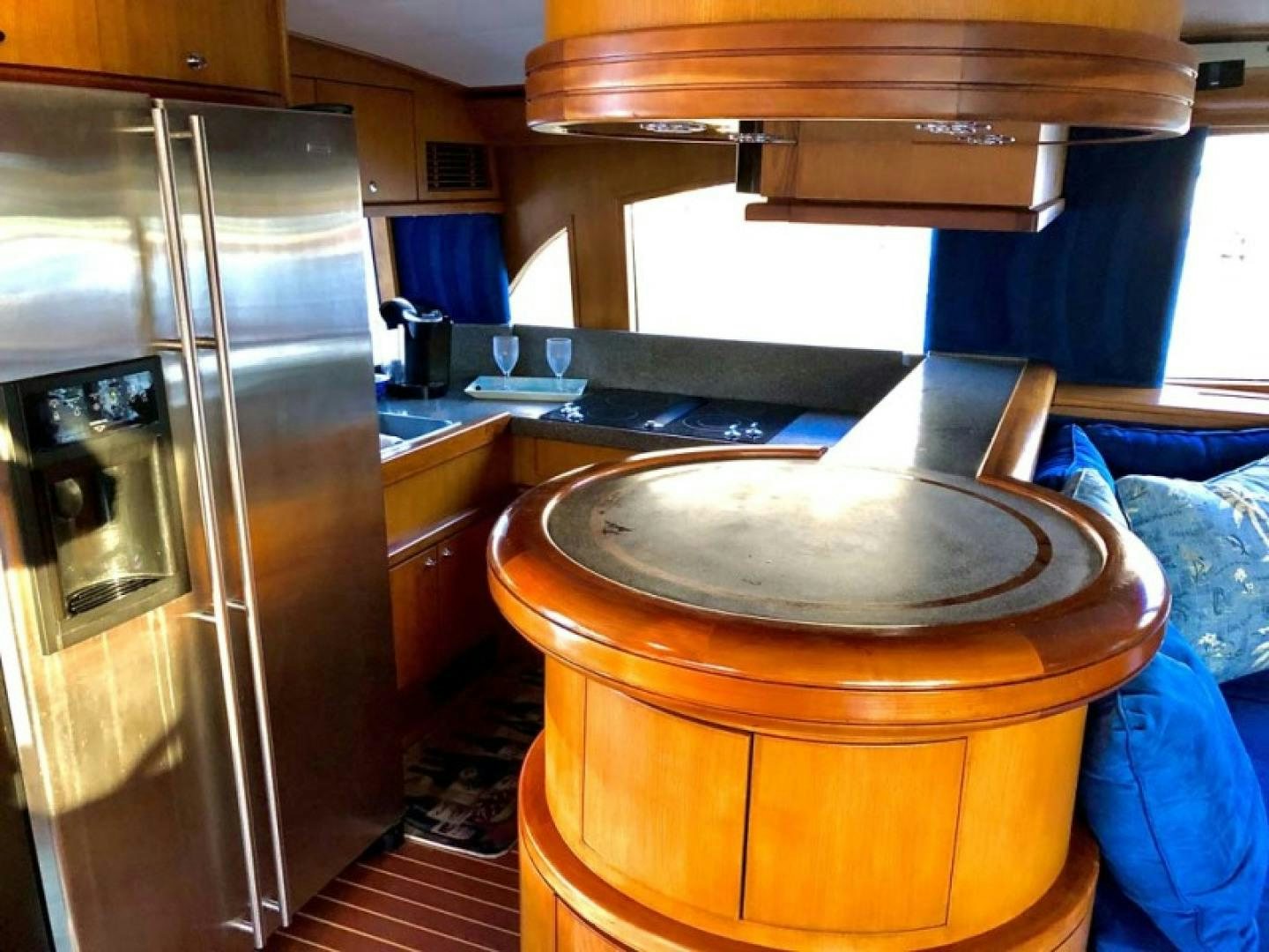 a kitchen with a large wooden pot aboard PRIME TIME Yacht for Sale