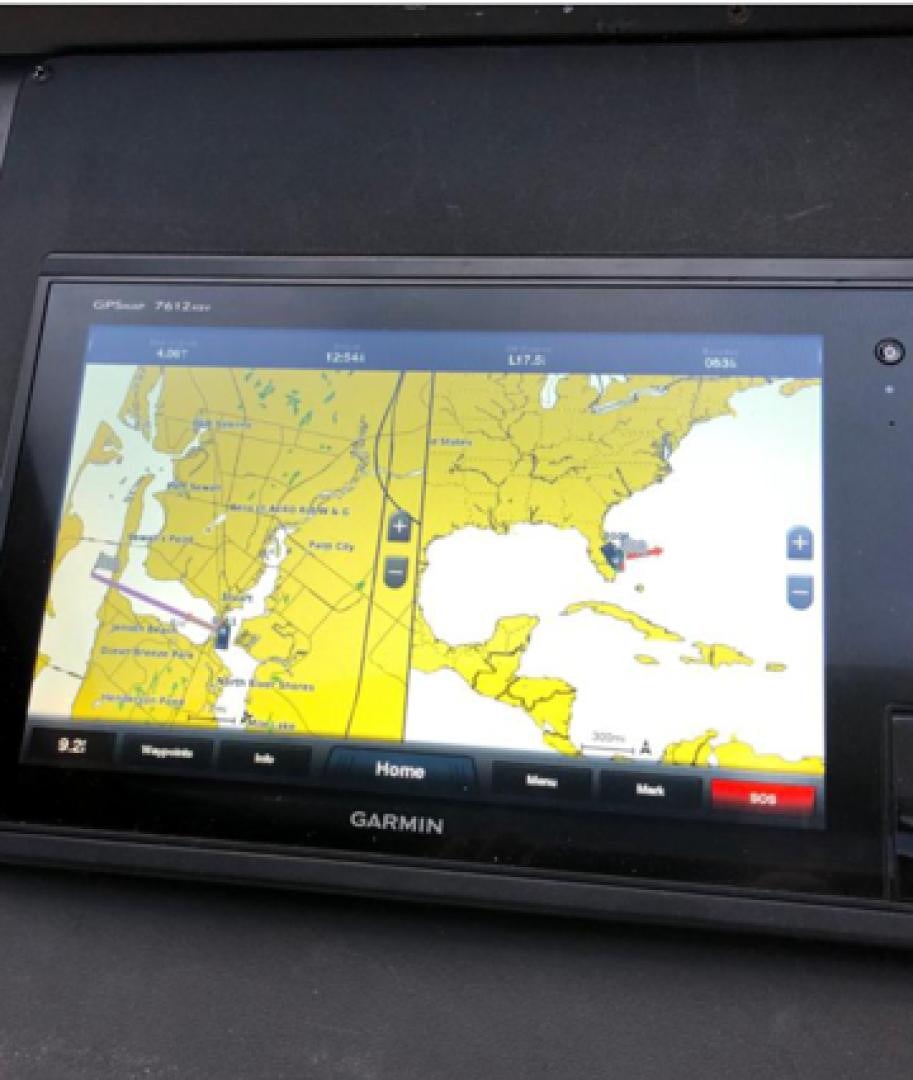 a tablet with a map on the screen aboard PRIME TIME Yacht for Sale