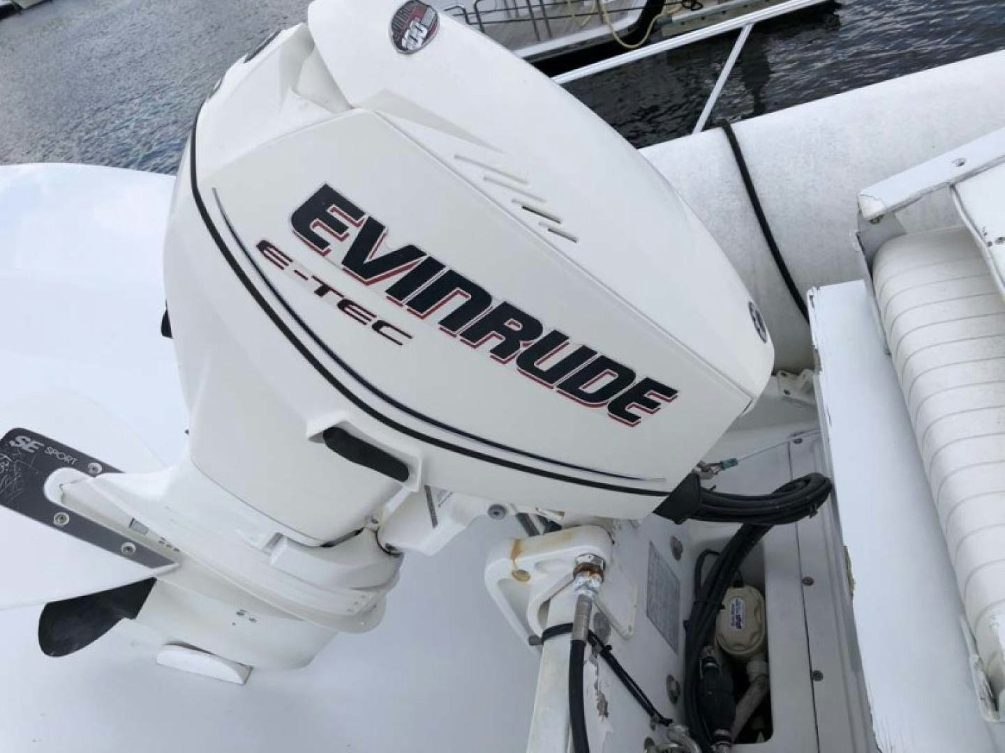 a white car with a license plate aboard PRIME TIME Yacht for Sale