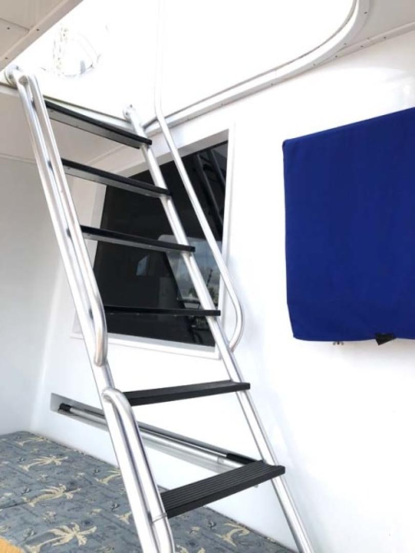 a ladder leaning against a wall aboard PRIME TIME Yacht for Sale