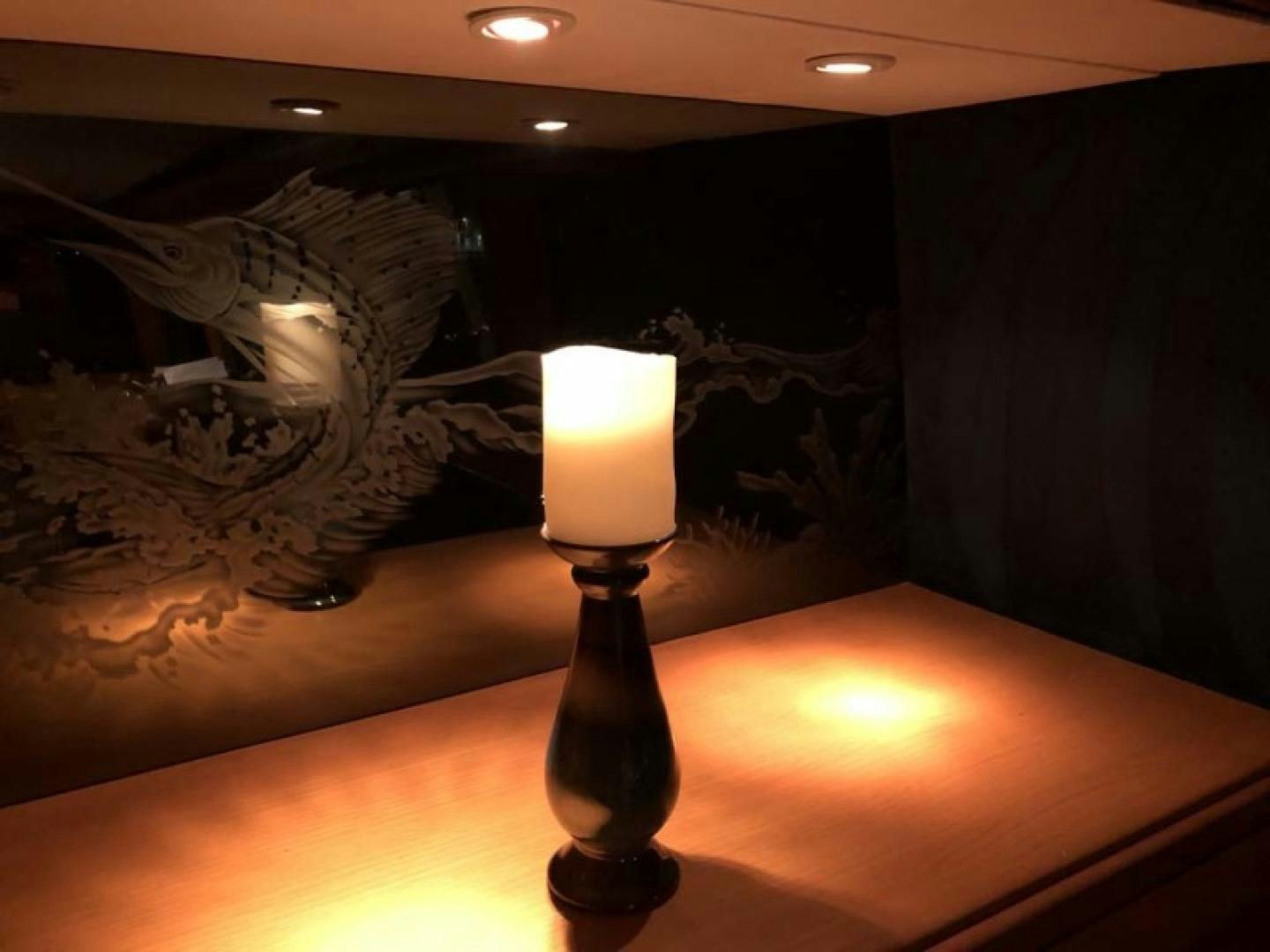 a lamp on a table aboard PRIME TIME Yacht for Sale