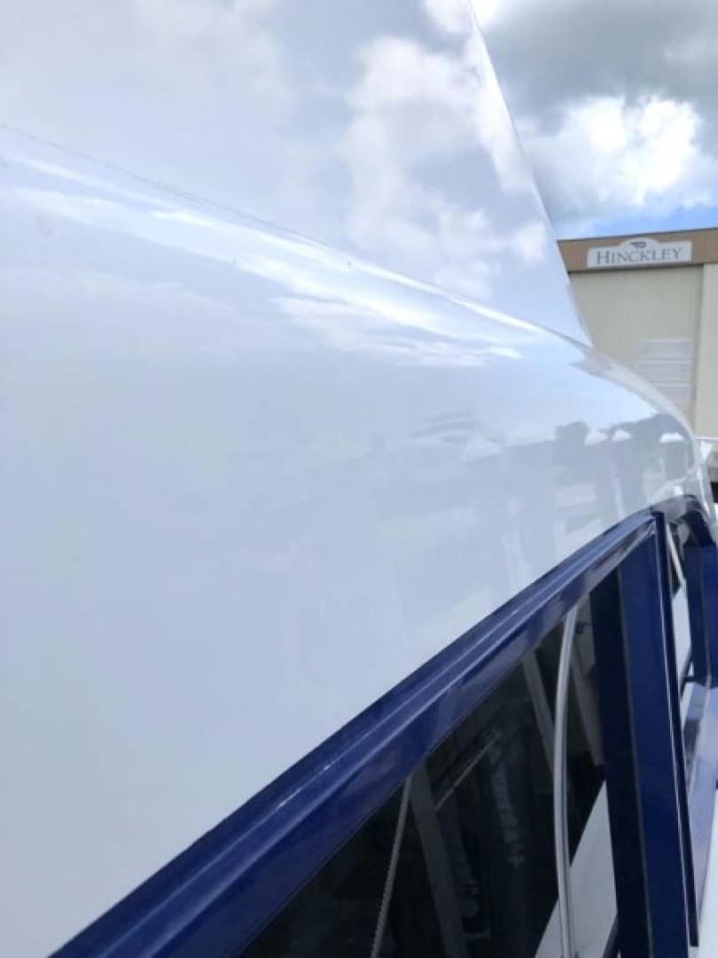 a blue sky with clouds aboard PRIME TIME Yacht for Sale