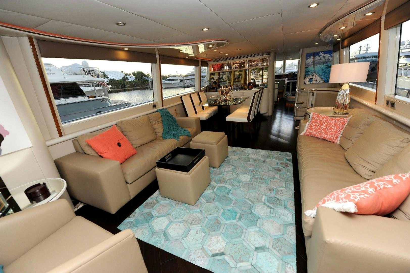 a living room with a large window aboard PLAN B Yacht for Sale