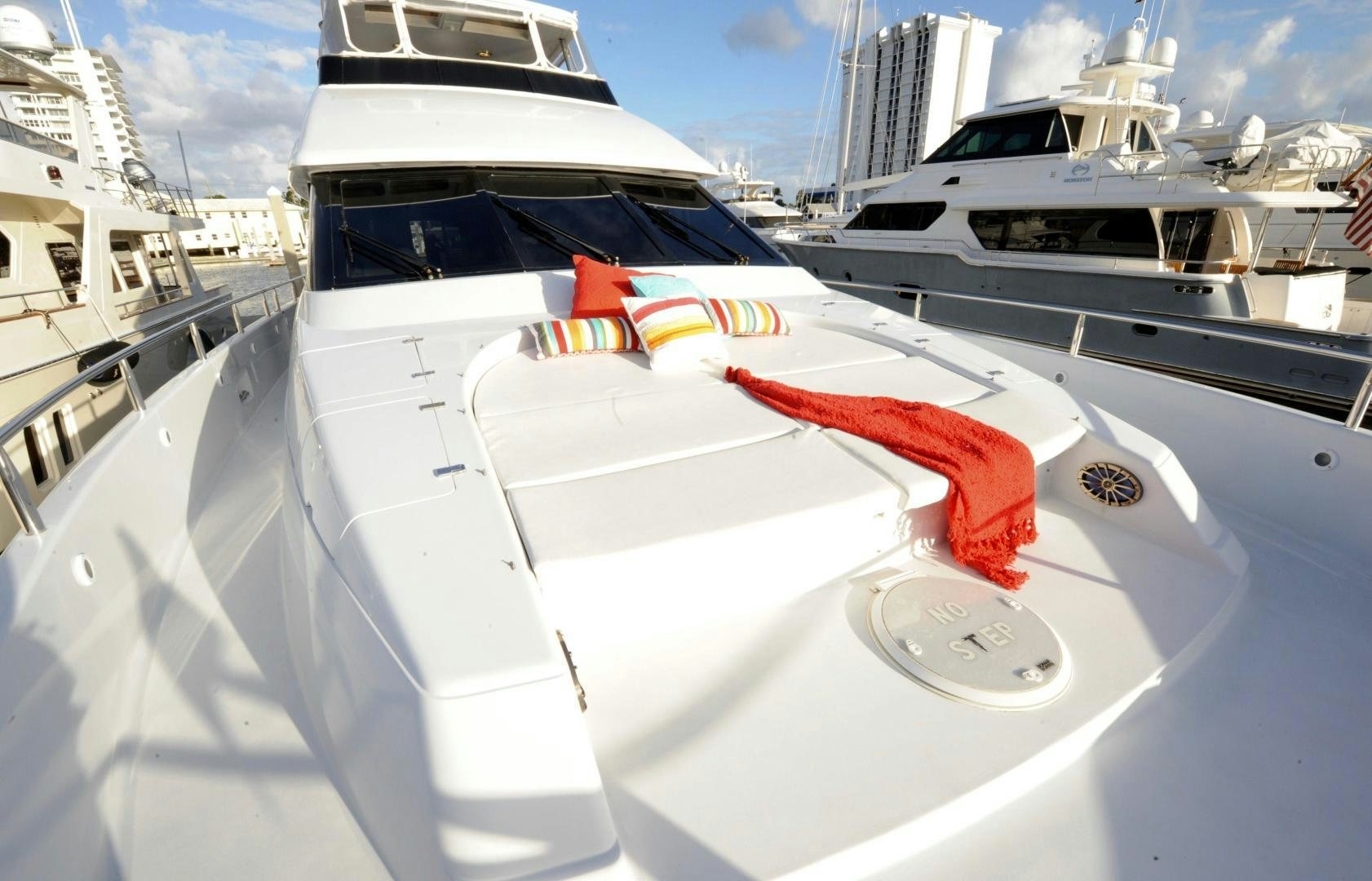 a boat with a red bow aboard PLAN B Yacht for Sale