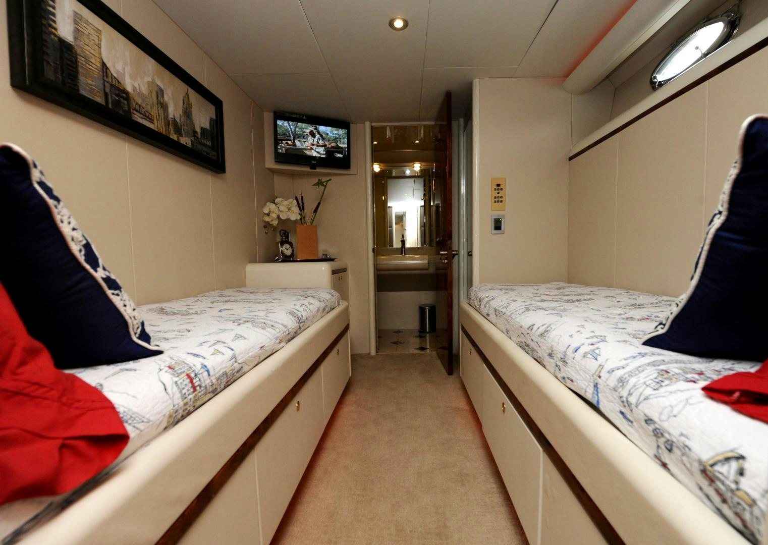 a couple of beds in a room aboard PLAN B Yacht for Sale