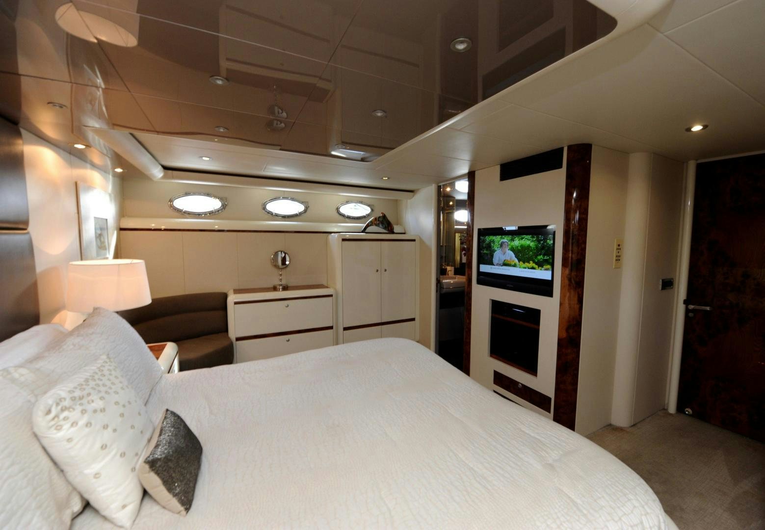 a bed in a room aboard PLAN B Yacht for Sale