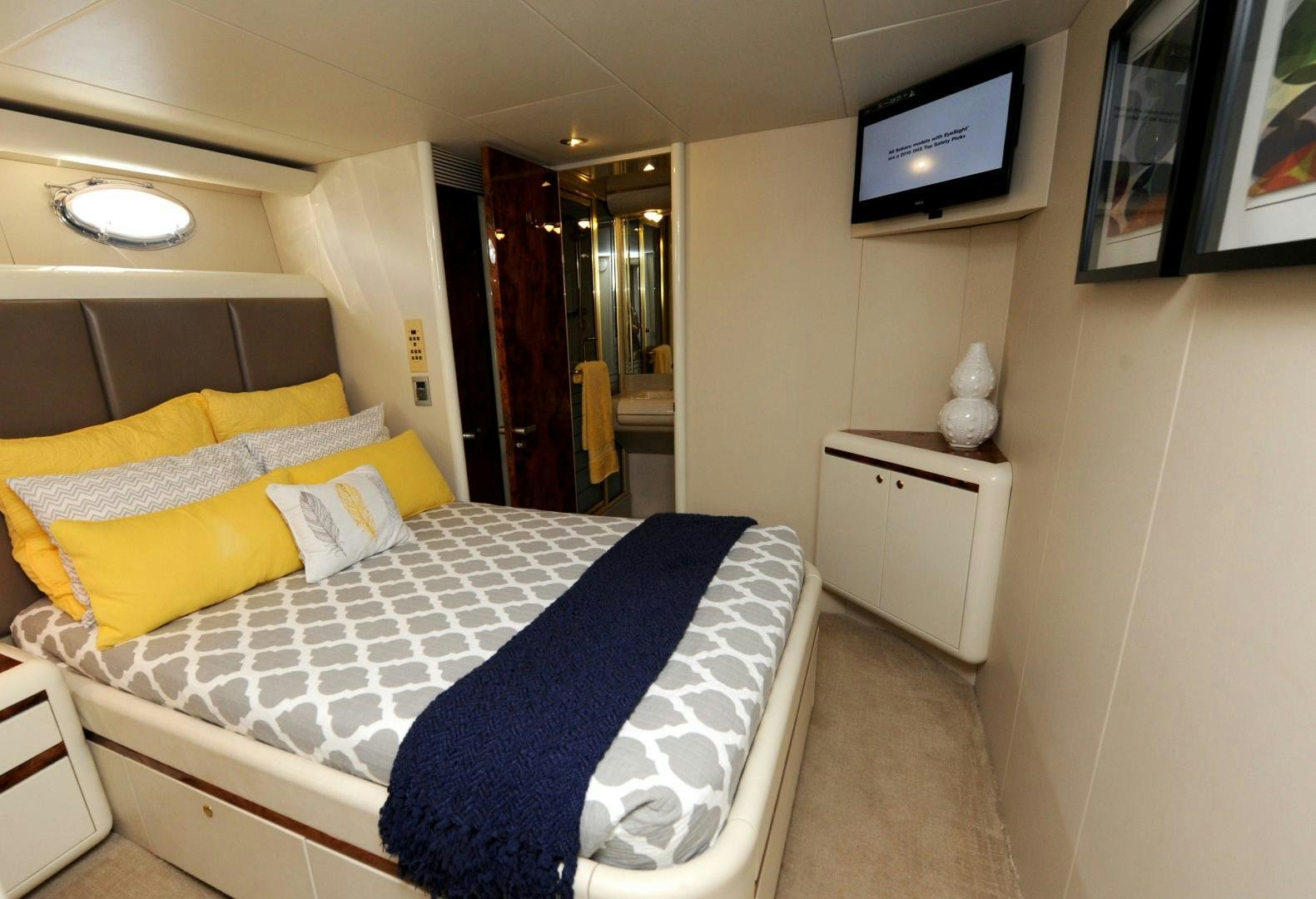a bed in a room aboard PLAN B Yacht for Sale