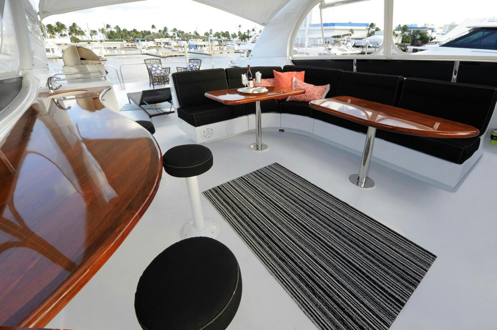 a piano in a room aboard PLAN B Yacht for Sale
