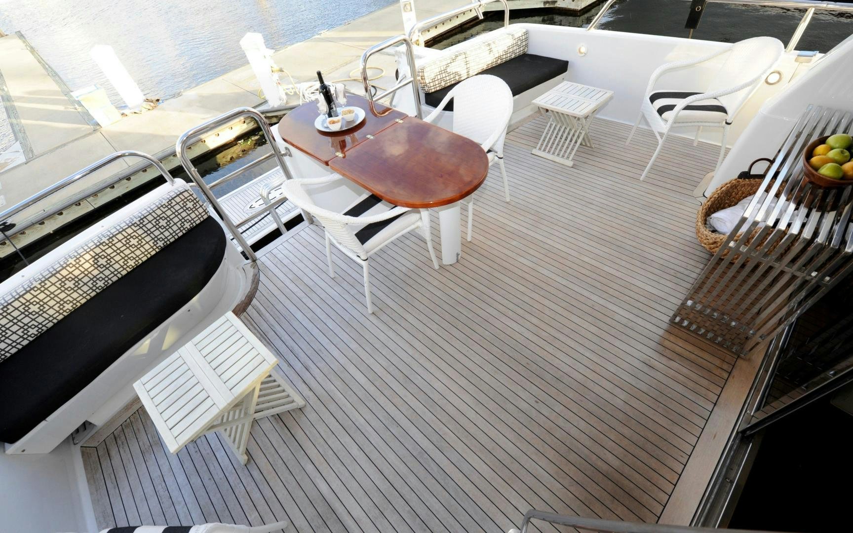 a boat on a deck aboard PLAN B Yacht for Sale