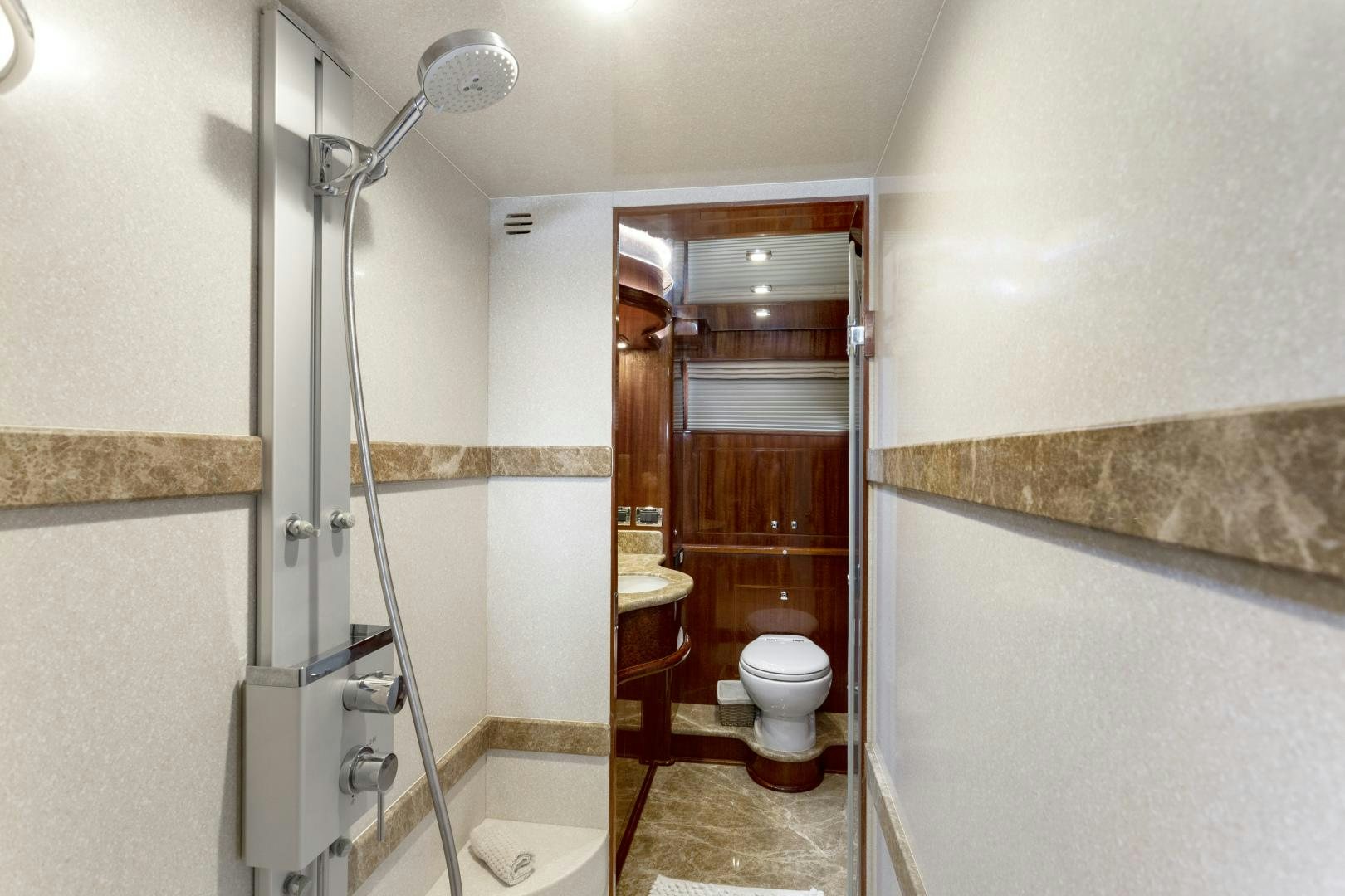 a bathroom with a standup shower aboard ODYSEA Yacht for Sale