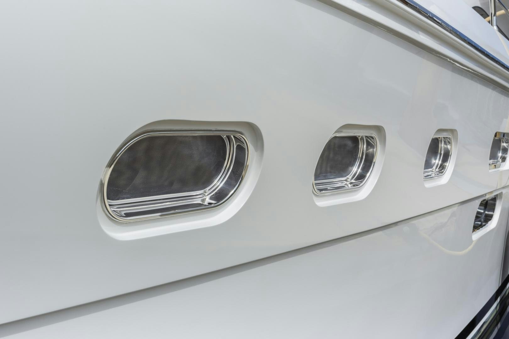 a silver car with a round window aboard ODYSEA Yacht for Sale