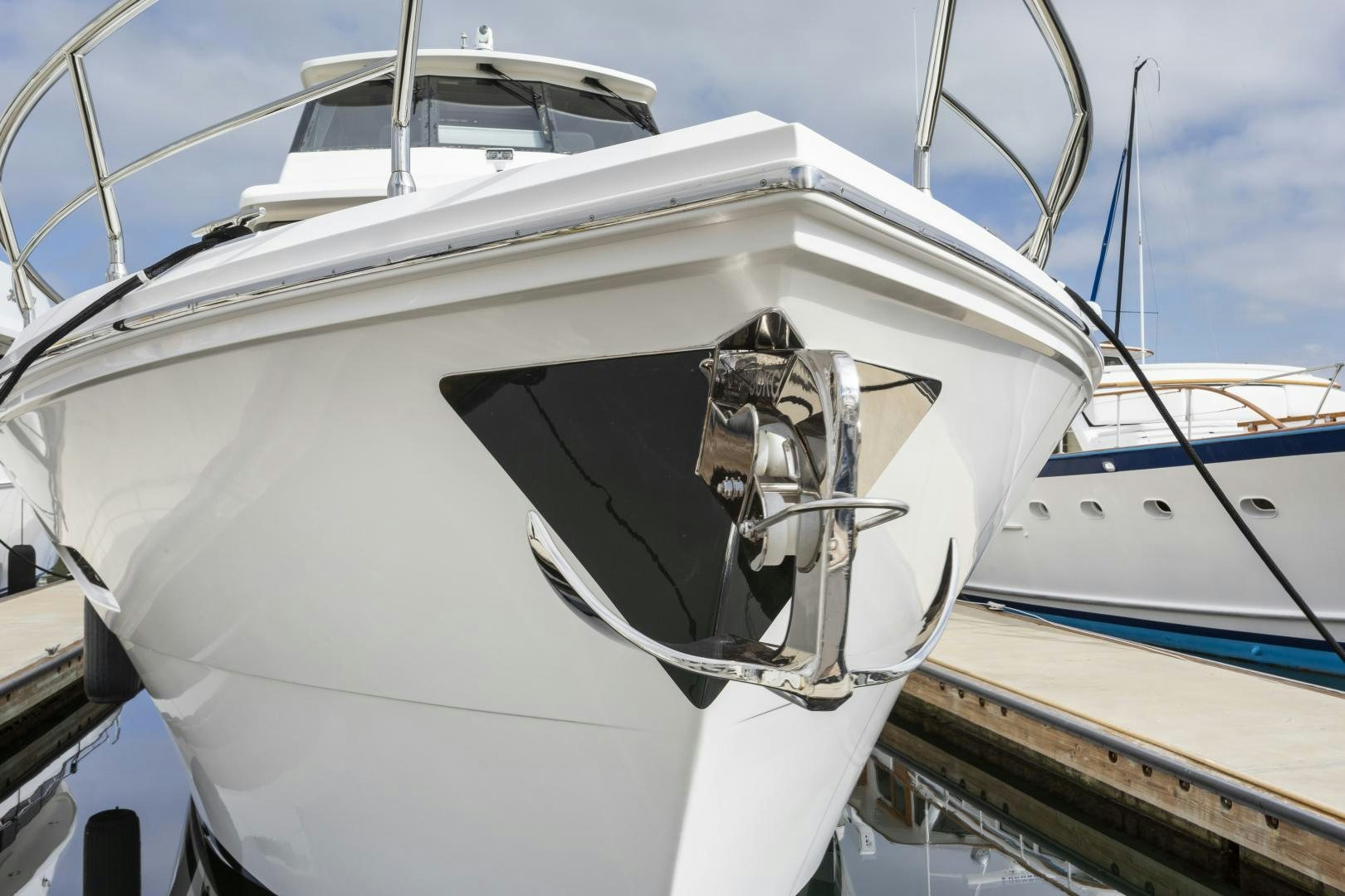 a white boat with a person inside aboard ODYSEA Yacht for Sale