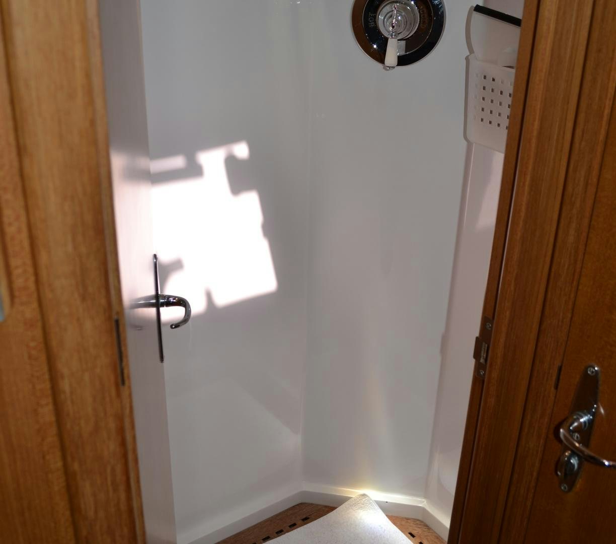 a door with a light on it aboard MEHETABEL Yacht for Sale