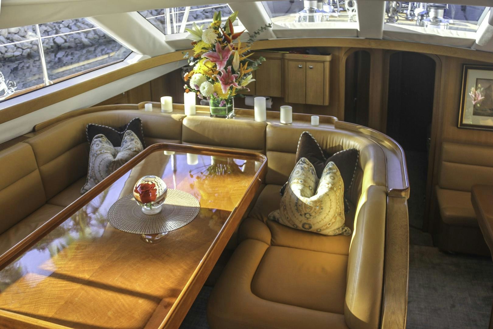 a cat lying on a chair aboard MEHETABEL Yacht for Sale