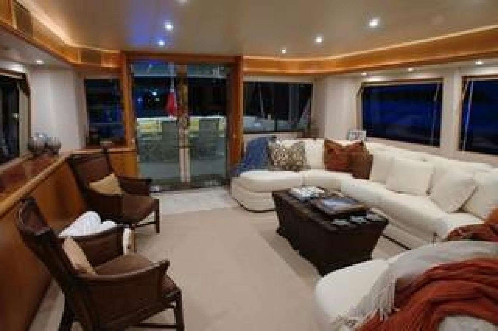 a living room with a large glass door aboard No Name Yacht for Sale