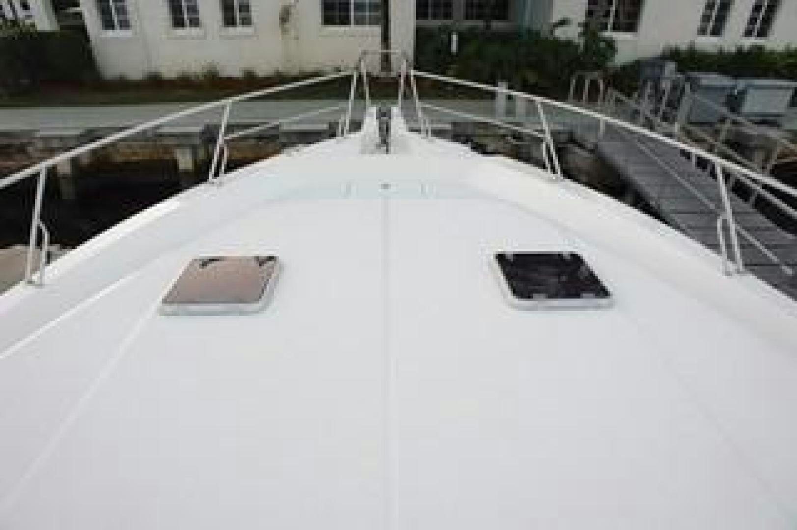 a car on a road aboard No Name Yacht for Sale