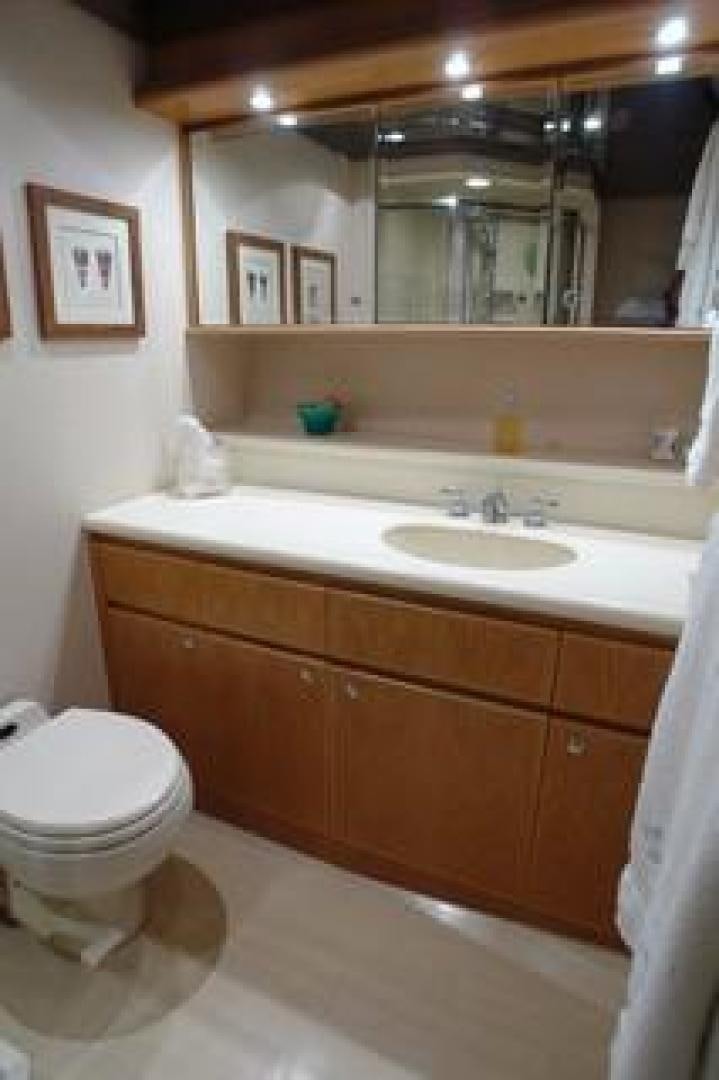 a bathroom with a sink and a toilet aboard No Name Yacht for Sale