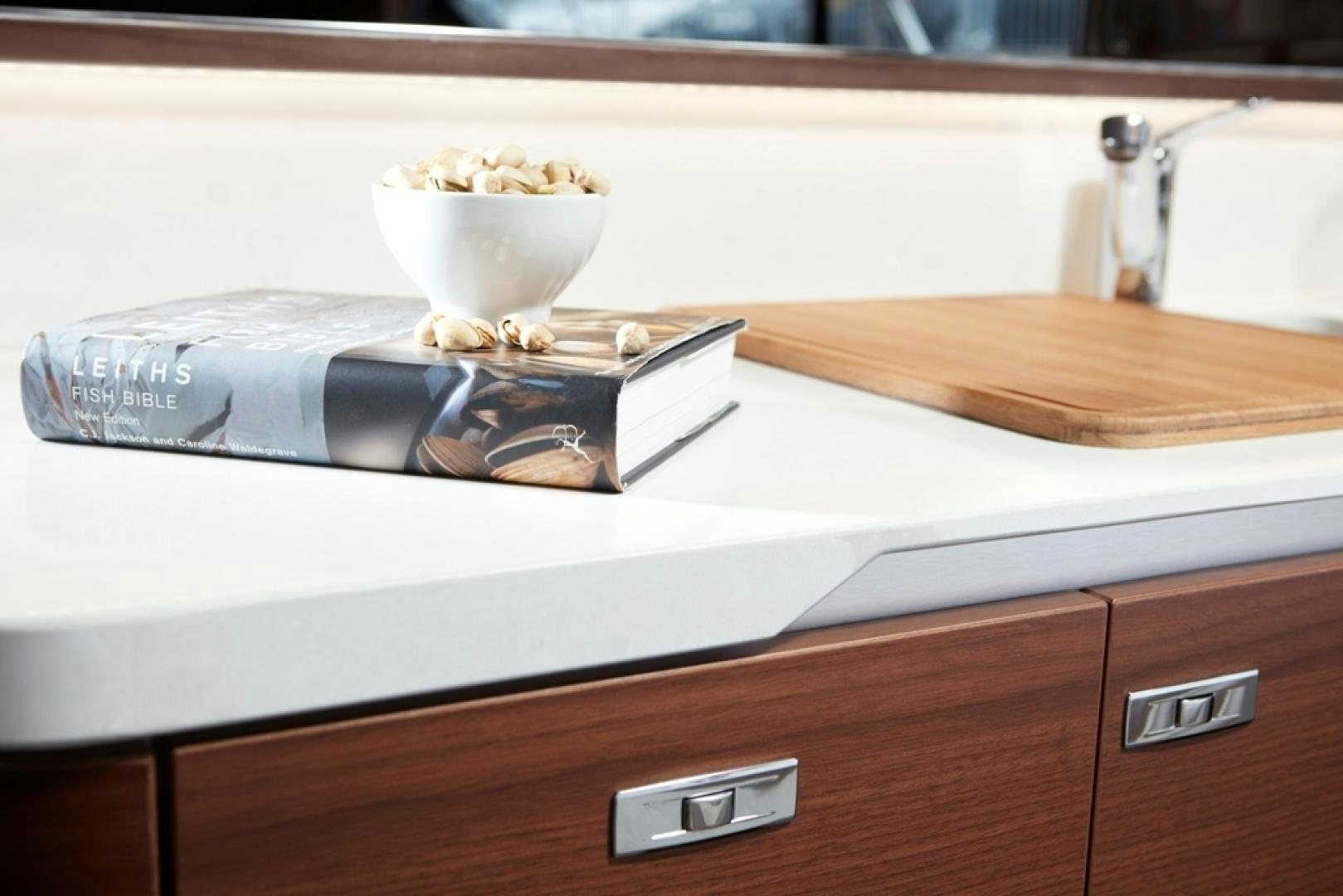 a bowl of popcorn on a counter aboard S78  Yacht for Sale
