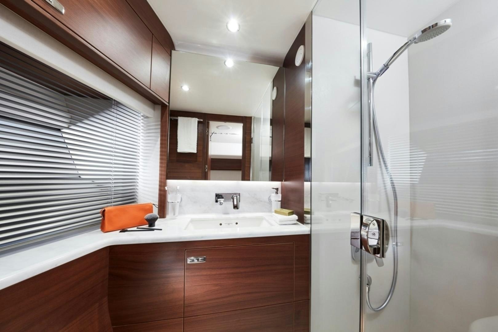 a bathroom with a shower unit and sink aboard S78  Yacht for Sale