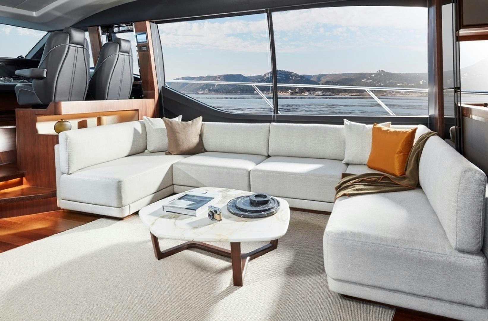 a white couch in a car aboard S78  Yacht for Sale